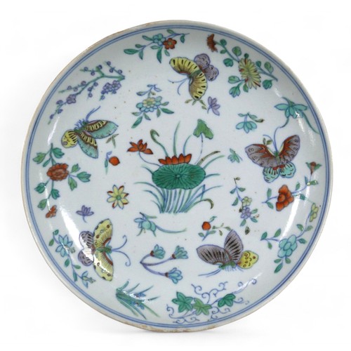 112 - A pair of 18th century Chinese famille verte dishes, decorated with butterflies floral sprigs and li... 