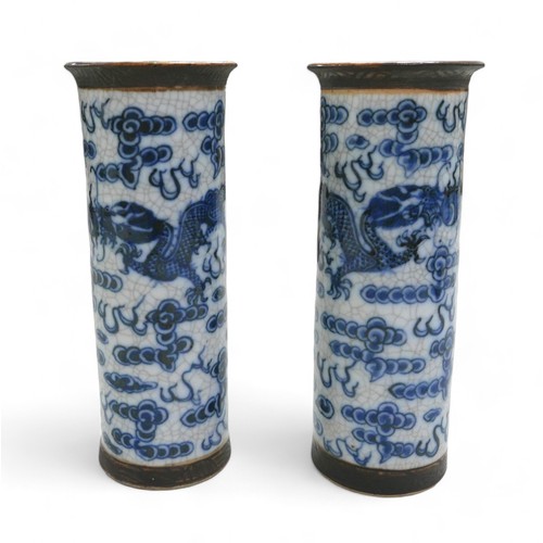 110 - Two pairs of Chinese blue and white import vases, comprising a pair of cylinder vases 8cm diameter 2... 