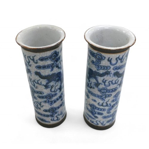 110 - Two pairs of Chinese blue and white import vases, comprising a pair of cylinder vases 8cm diameter 2... 