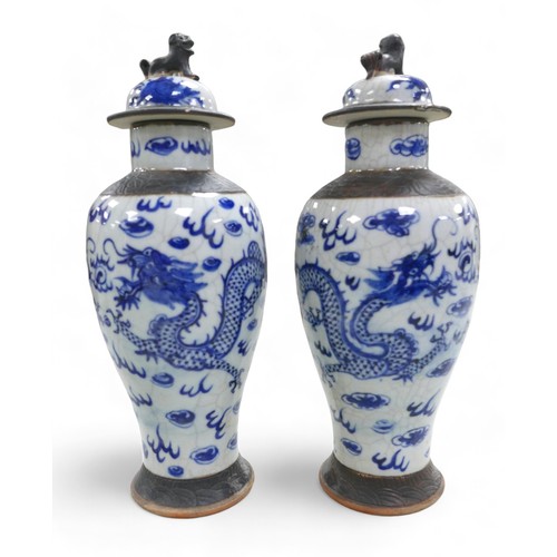 110 - Two pairs of Chinese blue and white import vases, comprising a pair of cylinder vases 8cm diameter 2... 