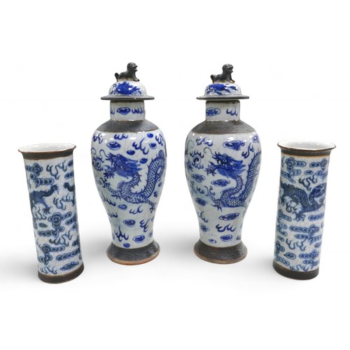 110 - Two pairs of Chinese blue and white import vases, comprising a pair of cylinder vases 8cm diameter 2... 