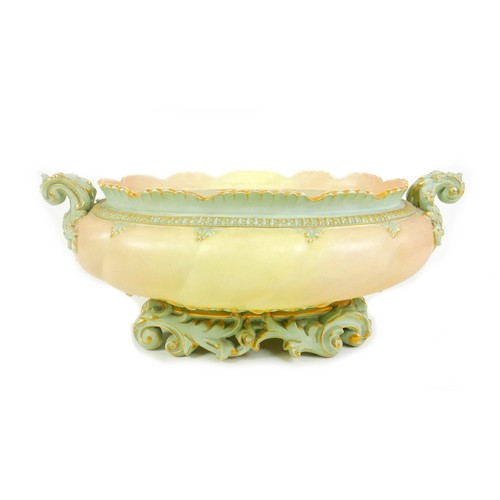 126 - A Victorian Royal Worcester china large oval blush planter or jardiniere, with twin acanthus side ha... 