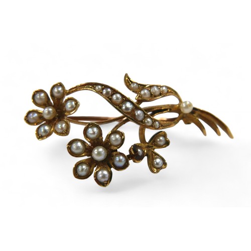 74 - Two pearl brooches, comprising a 15ct gold brooch, 3.7g, 3.7cm wide, together with a yellow metal mo... 