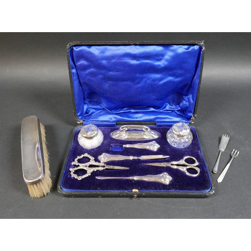 19 - A cased Edward VII silver part manicure set, Levi & Salaman, Birmingham 1906, together with a silver... 