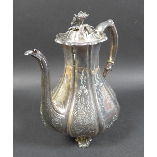 3 - A Victorian silver coffee pot, of bombe shape with engraved foliate decoration, floral final, the fo... 