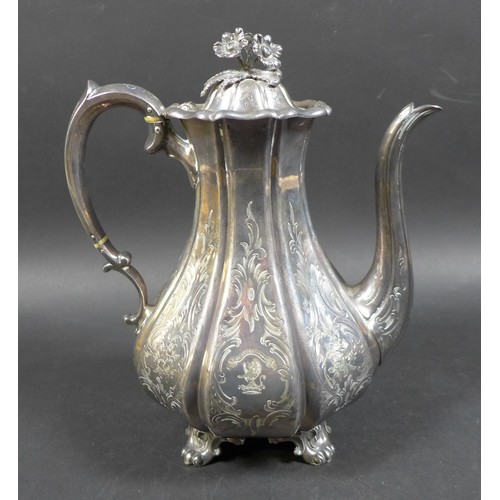 3 - A Victorian silver coffee pot, of bombe shape with engraved foliate decoration, floral final, the fo... 