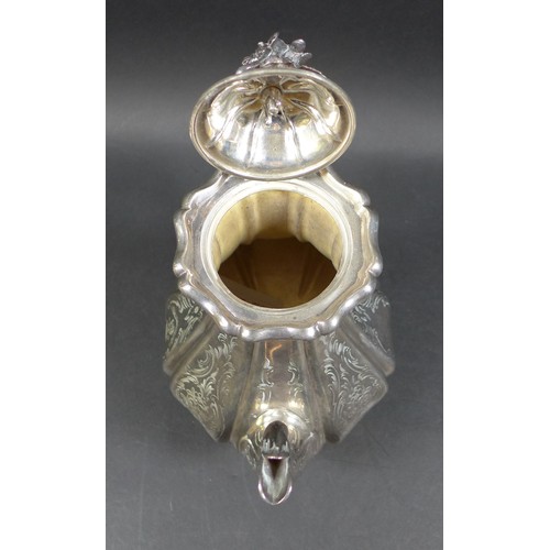 3 - A Victorian silver coffee pot, of bombe shape with engraved foliate decoration, floral final, the fo... 