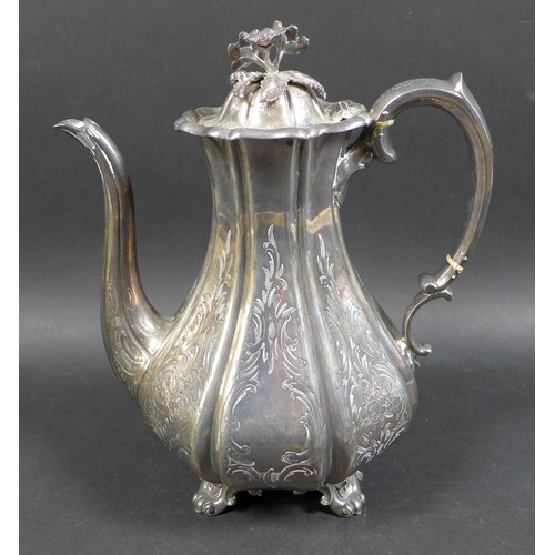 3 - A Victorian silver coffee pot, of bombe shape with engraved foliate decoration, floral final, the fo... 