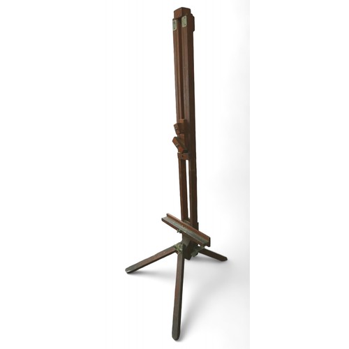 222 - Two artists easels, comprising a vintage adjustable easel on tripod legs, 181cm high, together with ... 