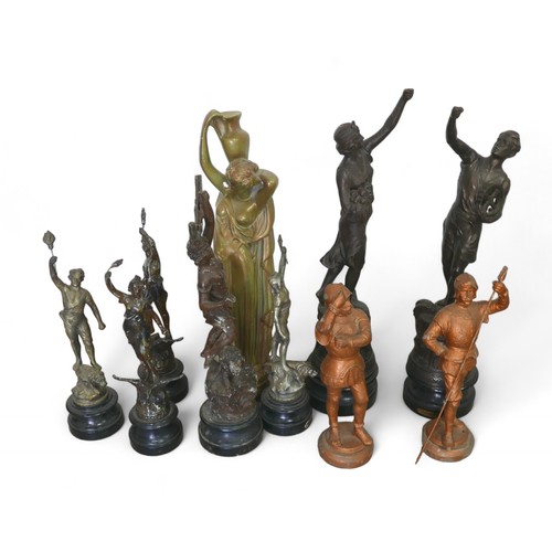 147 - A mixed group of metal wares, including 10 spelter figurines, tallest 55cm high, a cast iron fire gr... 