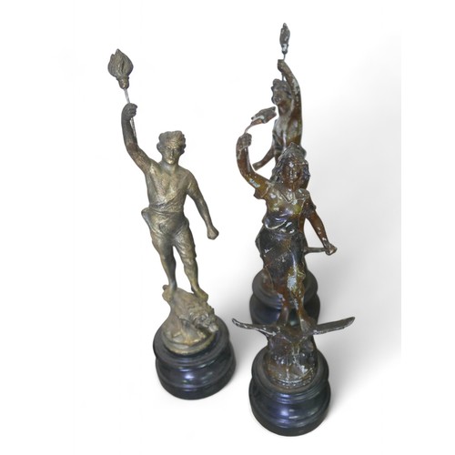 147 - A mixed group of metal wares, including 10 spelter figurines, tallest 55cm high, a cast iron fire gr... 