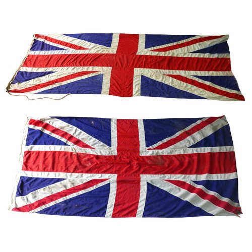 184 - Two large 20th century Union Jack flags, 103 by 226cm, and 160 by 354cm. (2)