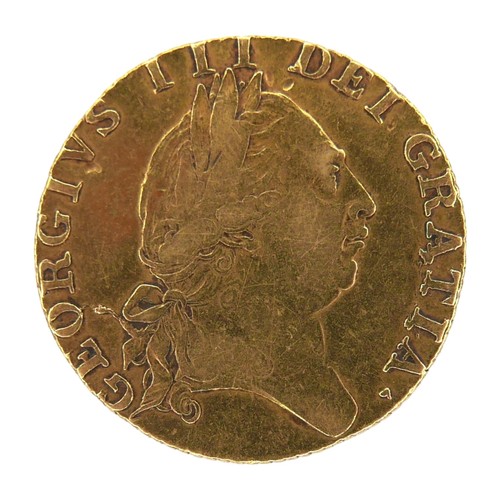 40 - A George III gold spade guinea, 1787, obverse with fifth laureate portrait of King George III right,... 