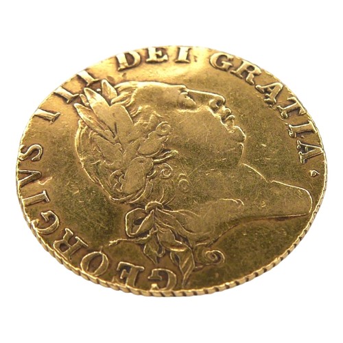 40 - A George III gold spade guinea, 1787, obverse with fifth laureate portrait of King George III right,... 