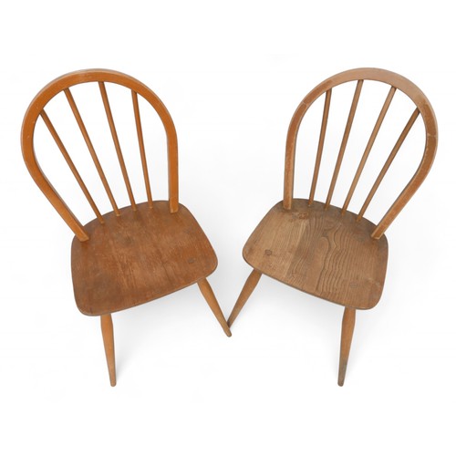 271 - A pair of Ercol elm seated kitchen chairs, seat height 43cm, overall 86cm high. (2)