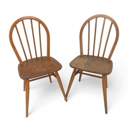 271 - A pair of Ercol elm seated kitchen chairs, seat height 43cm, overall 86cm high. (2)