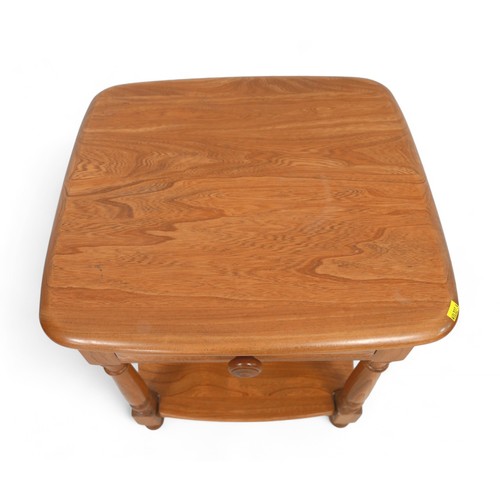 273 - An Ercol blonde elm bedside table, with a drawer and undertier, 48 by 45 by 54cm high.