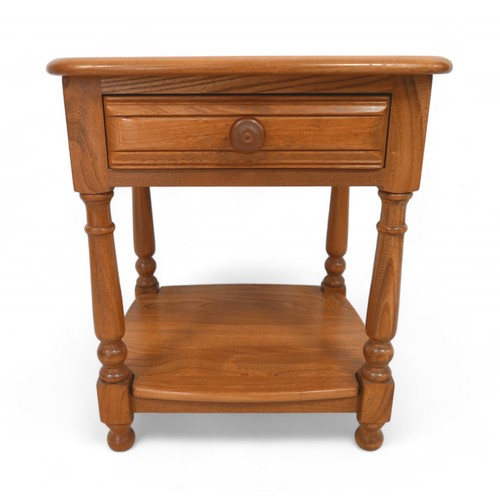 273 - An Ercol blonde elm bedside table, with a drawer and undertier, 48 by 45 by 54cm high.