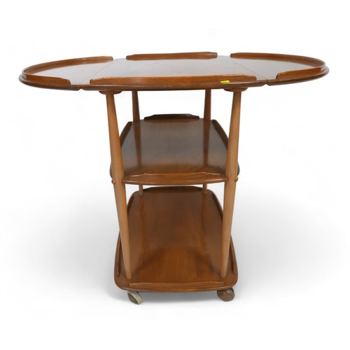 275 - An Ercol elm drop leaf hostess trolley, 95 by 73 by 76cm high.