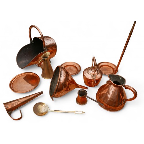 150 - A collection of assorted copper and brass items, including a kettle, beer warmer, scuttle, and three... 