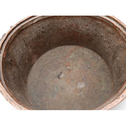 151 - A large copper and iron cook pot, a copper and iron lidded cook pot, an eastern copper tray and plan... 