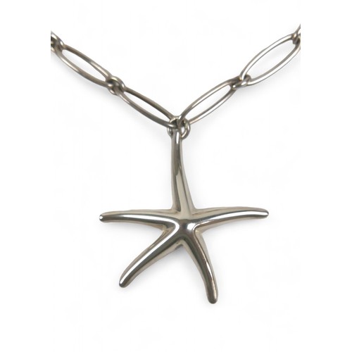 82 - A Tiffany & Co. silver Elsa Peretti pendant necklace, the silver starfish shaped pendant suspended f... 