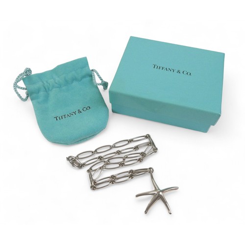 82 - A Tiffany & Co. silver Elsa Peretti pendant necklace, the silver starfish shaped pendant suspended f... 