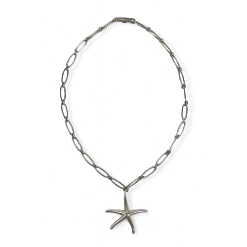 82 - A Tiffany & Co. silver Elsa Peretti pendant necklace, the silver starfish shaped pendant suspended f... 