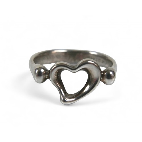 68 - A silver heart ring by Tiffany, designed by Elsa Peretti, Signed 'Tiffany & Co. Peretti Spain, size ... 