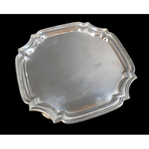 28 - An Elizabeth II silver salver, of square form with incuse corners and stepped rim, Wakely & Wheeler,... 