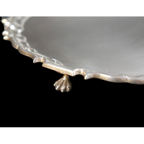 31 - An Elizabeth II silver salver, with Chippendale piecrust rim and claw feet, Barker Ellis Silver Co, ... 