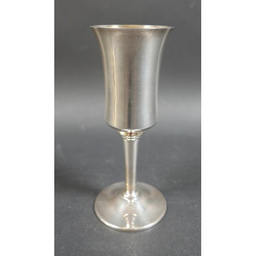 29 - A pair of contemporary silver goblets, with waisted bowls, plain stems and circular foot, A T Cannon... 