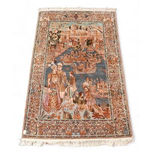 335 - A Persian hand knotted pictorial woolen rug, 126 by 210cm.