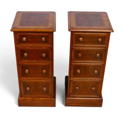 360 - A pair of new walnut four drawer bedside chests with crossbanded tops, 33 by 33 by 78cm high.