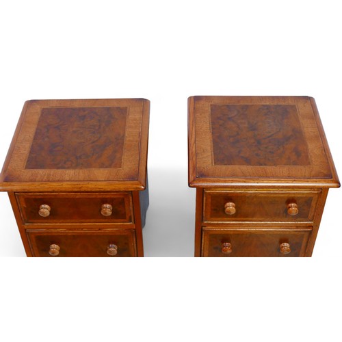 360 - A pair of new walnut four drawer bedside chests with crossbanded tops, 33 by 33 by 78cm high.