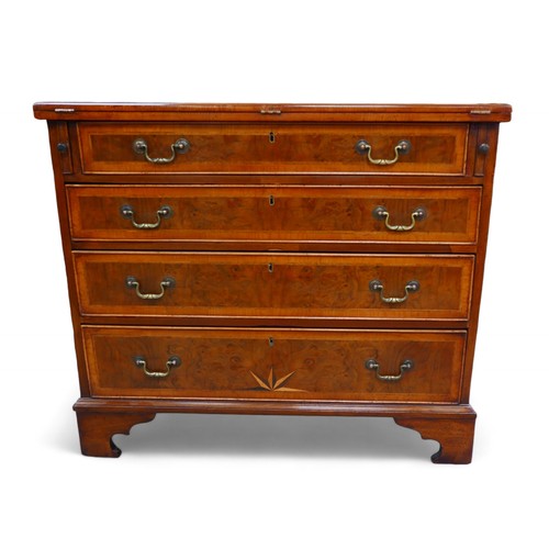 363 - A George III and later walnut bachelors chest, with a star inlaid folder top above three long gradua... 