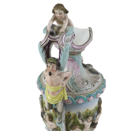 118 - A continental porcelain cherub ewer, 16 by 38cm.