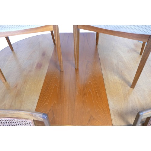 270 - A 1960s G-Plan 'Fresco' teak extendable dining table and chairs, the dining table having pull-out ac... 