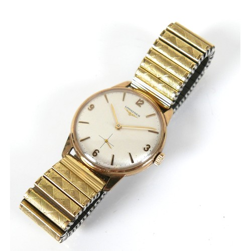 58 - A Longines 9ct gold gentleman's wristwatch, circa 1960s, the pale silvered dial with Arabic numerals... 