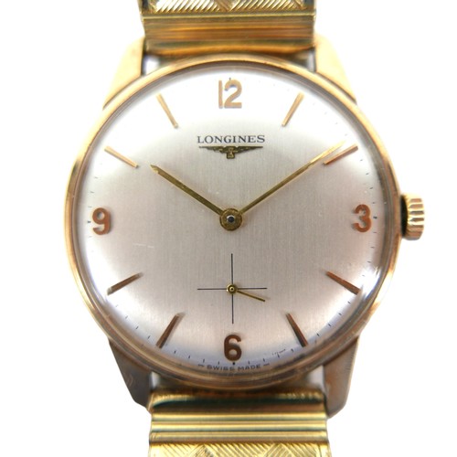 58 - A Longines 9ct gold gentleman's wristwatch, circa 1960s, the pale silvered dial with Arabic numerals... 