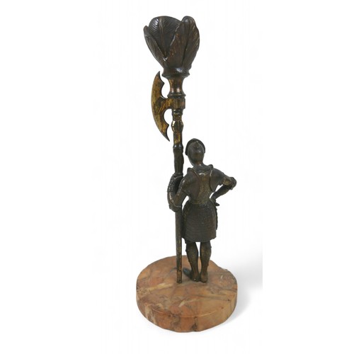 156 - A pair of Victorian bronze figural candlesticks, each modelled as a man in a suit of armour holding ... 