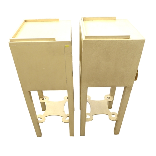 298 - A pair of modern bedside cabinets, painted cream, each with a single door and drawer below with ring... 