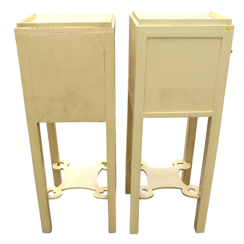 298 - A pair of modern bedside cabinets, painted cream, each with a single door and drawer below with ring... 