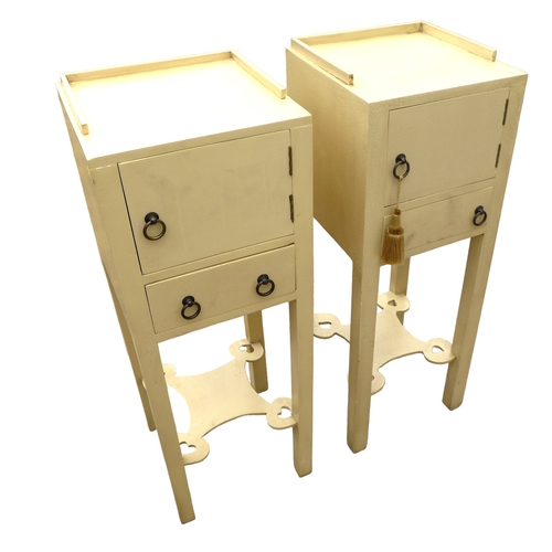 298 - A pair of modern bedside cabinets, painted cream, each with a single door and drawer below with ring... 