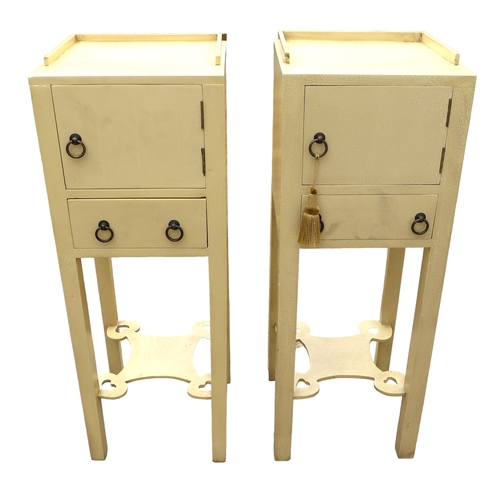 298 - A pair of modern bedside cabinets, painted cream, each with a single door and drawer below with ring... 