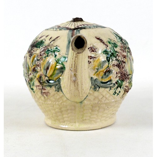 128 - A Staffordshire creamware teapot, circa 1765, probably by William Greatbatch, of ovoid form decorate... 