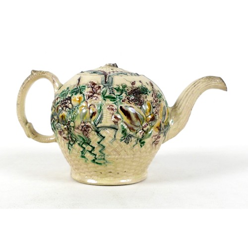 128 - A Staffordshire creamware teapot, circa 1765, probably by William Greatbatch, of ovoid form decorate... 