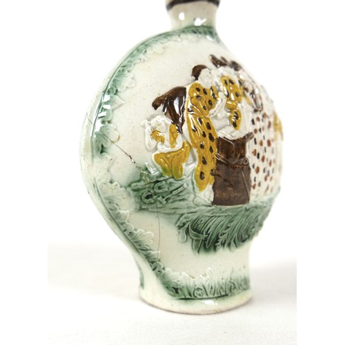 124 - A late 18th century Staffordshire creamware flask, of ovoid form with oval foot and small neck openi... 