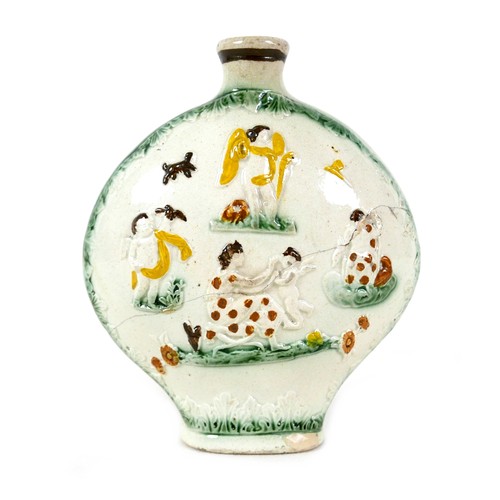 124 - A late 18th century Staffordshire creamware flask, of ovoid form with oval foot and small neck openi... 