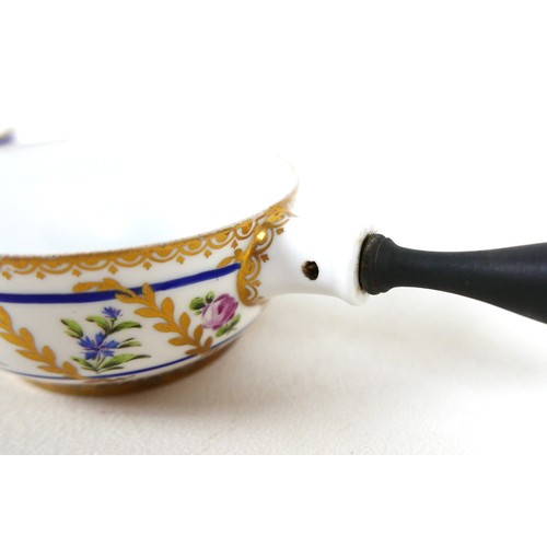 125 - An 18th century Sèvres porcelain saucepan, circa 1780, decorated with nine floral sprigs separated b... 